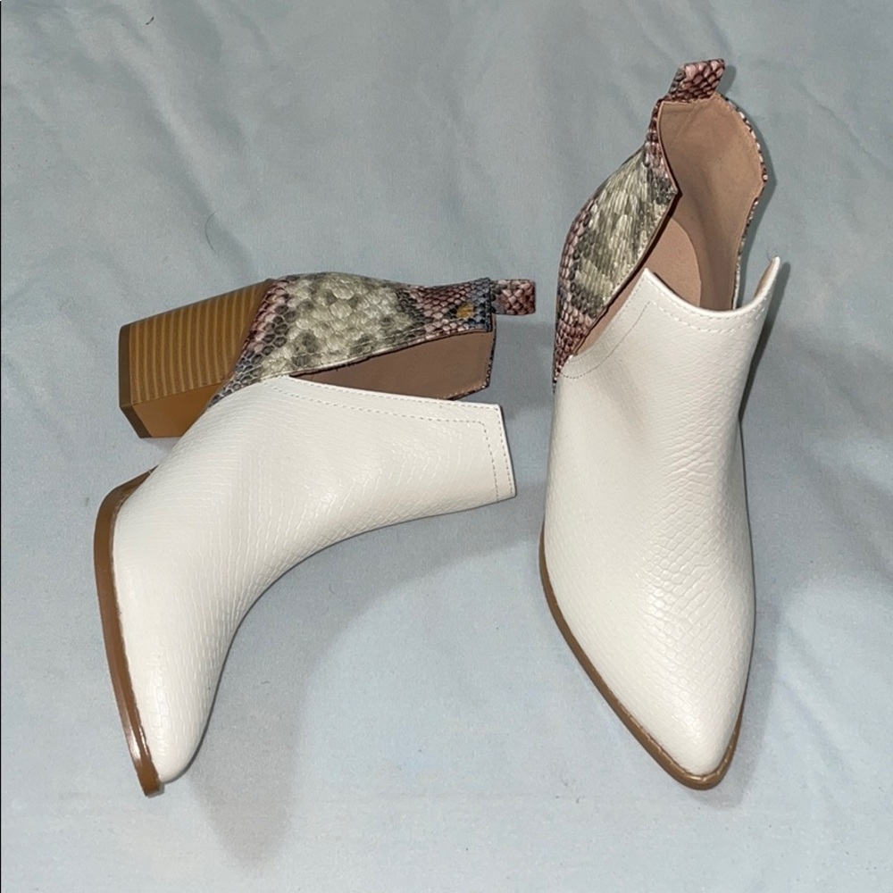 brand new white booties w snake pattern detail